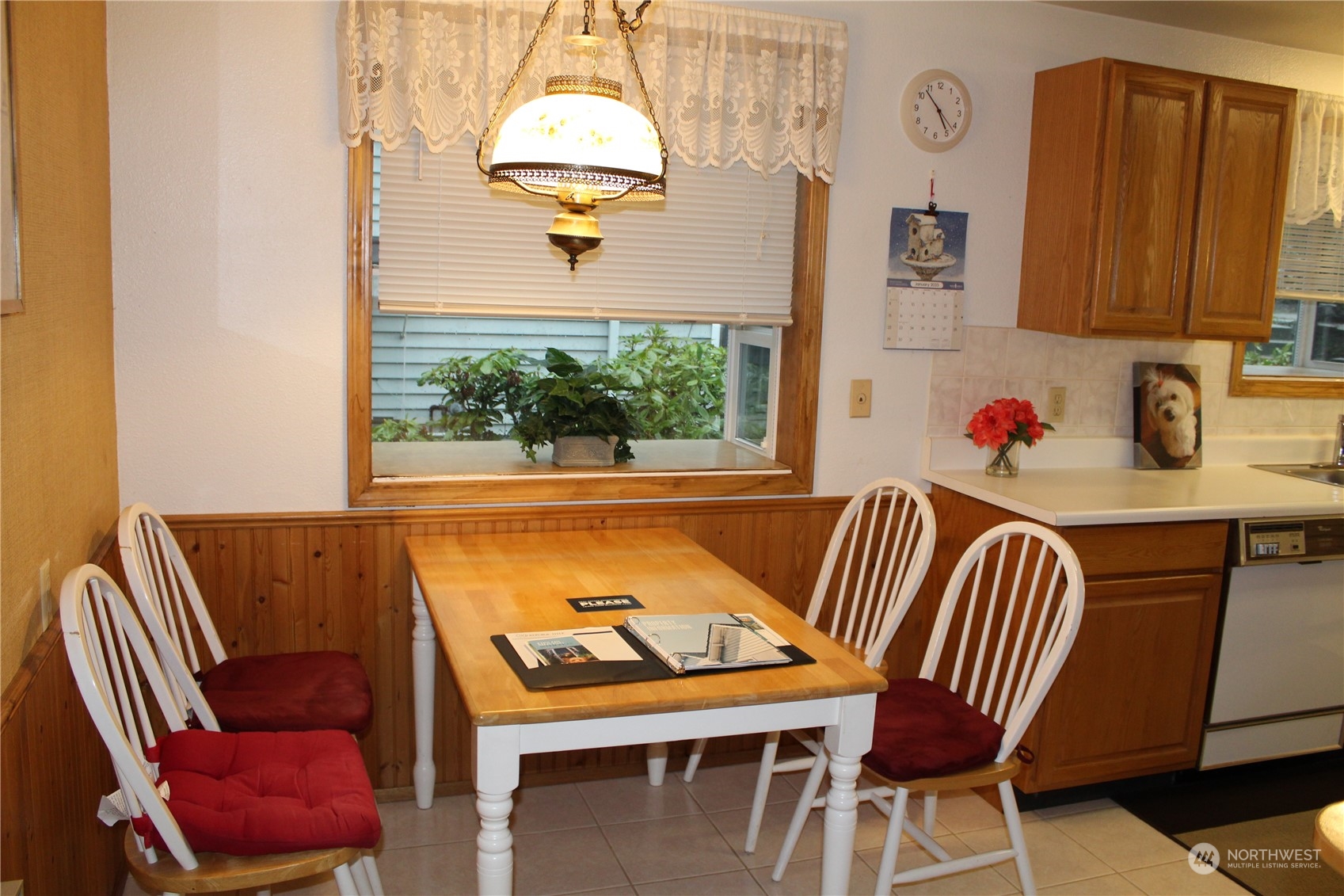 2519 Northeast 145th Street Seattle, WA 98125 - Photo 12 of 34 a view of a dining room with furniture window and outside view