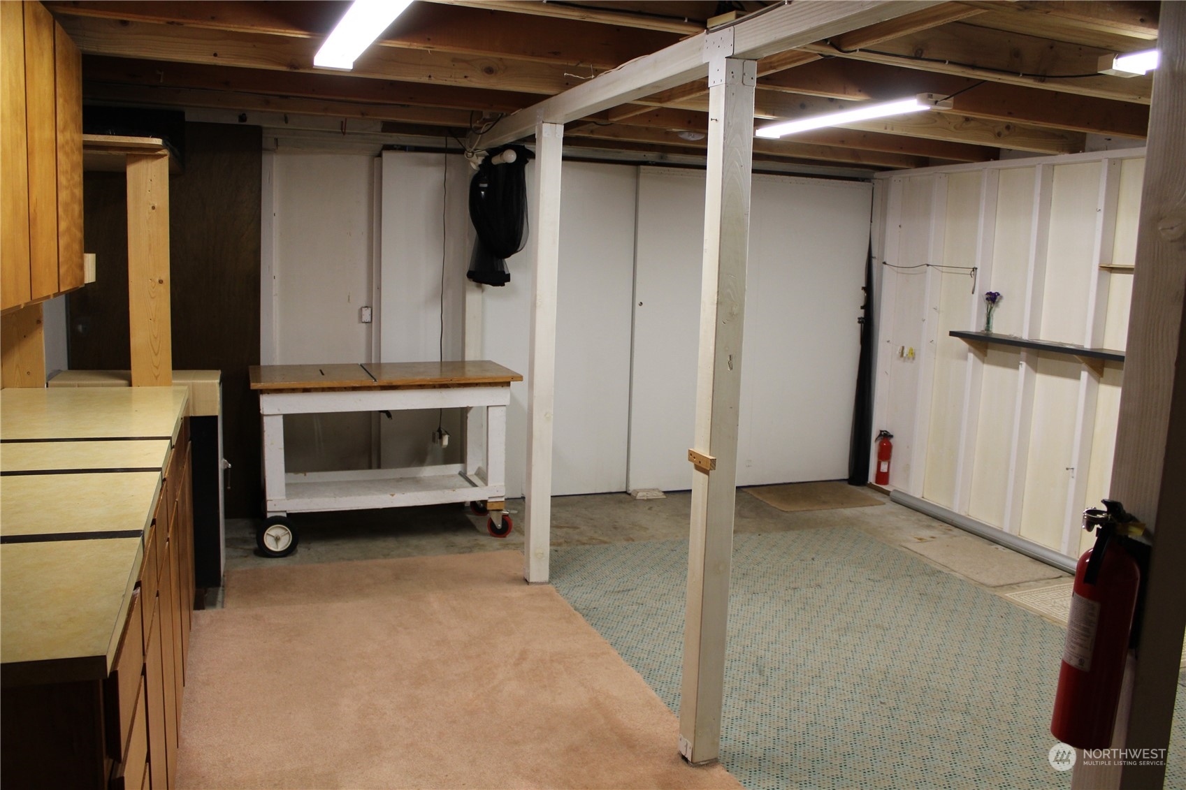 2519 Northeast 145th Street Seattle, WA 98125 - Photo 33 of 34 a view of an empty room with a fireplace