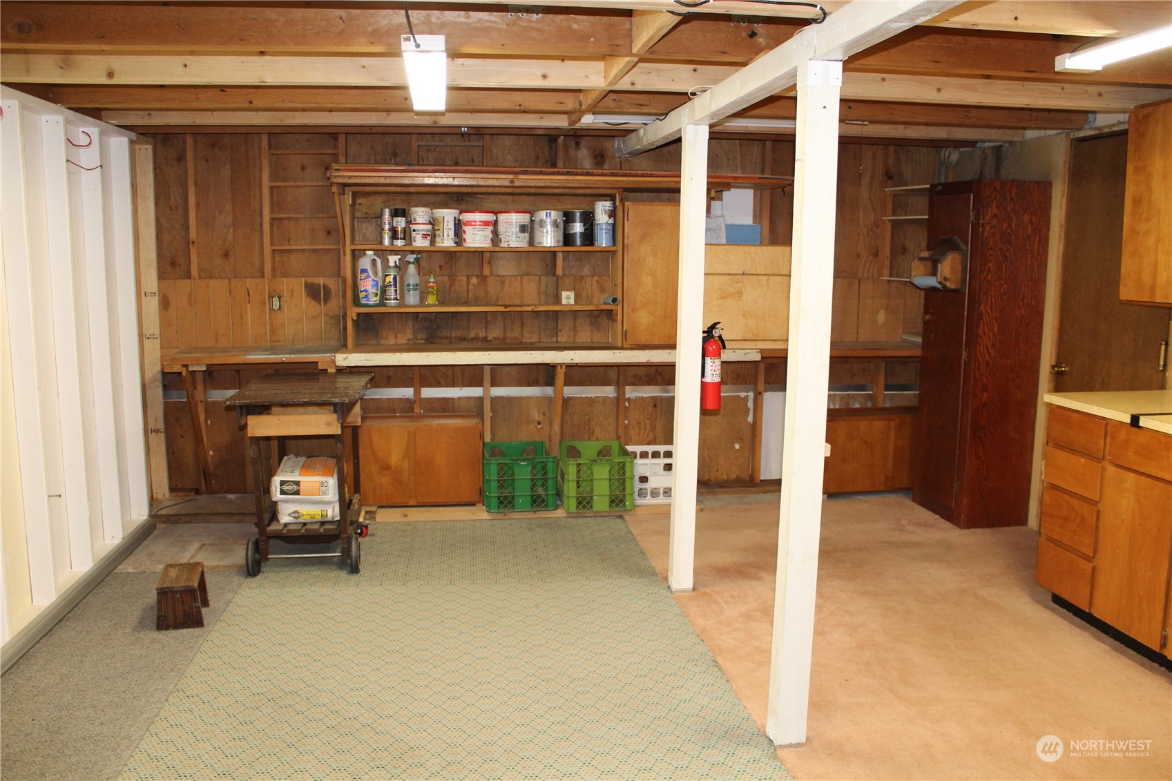 2519 Northeast 145th Street Seattle, WA 98125 - Photo 34 of 34 an empty room with wooden floor and windows