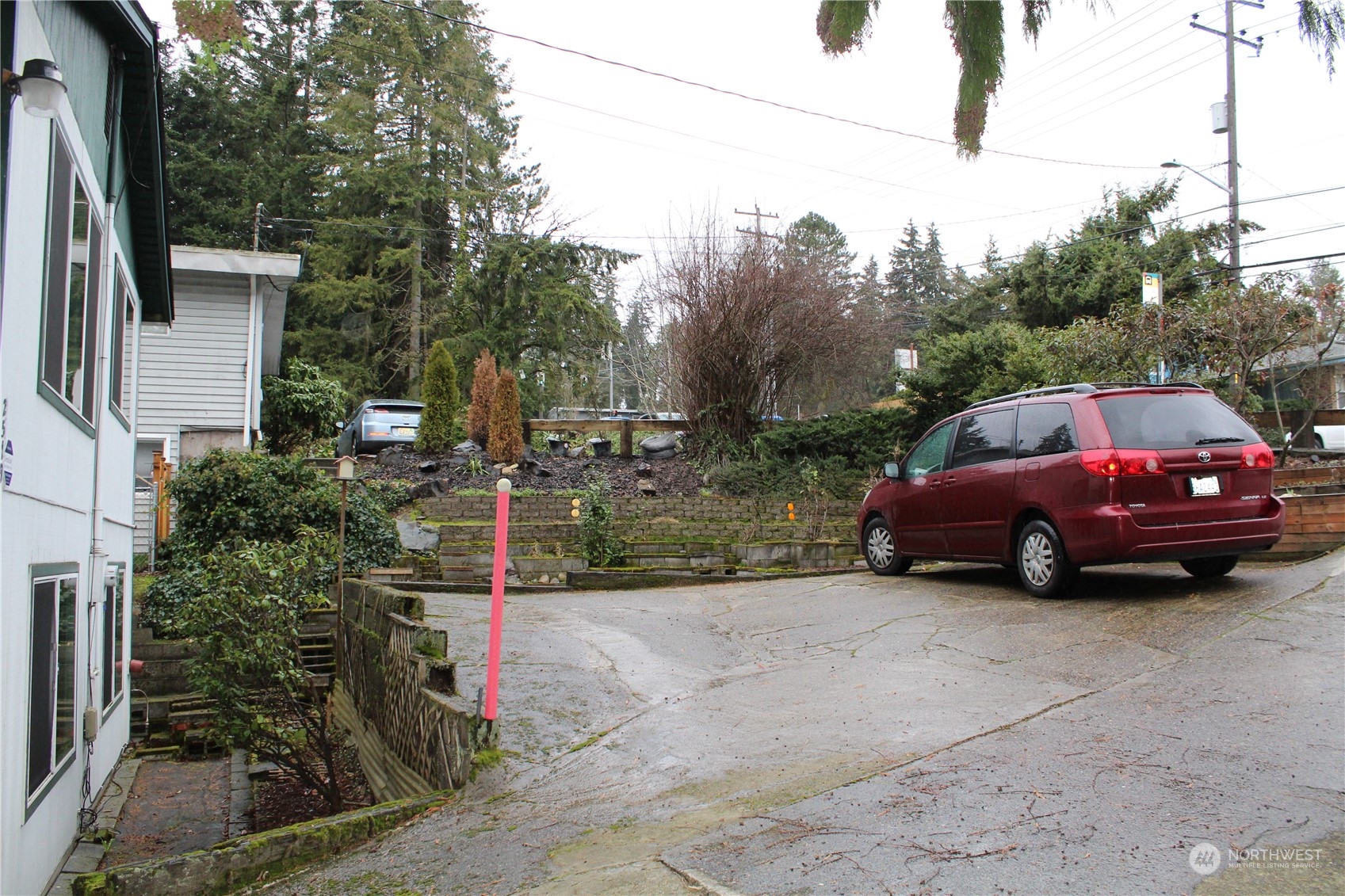 2519 Northeast 145th Street Seattle, WA 98125 - Photo 5 of 34 a view of a car in front of house