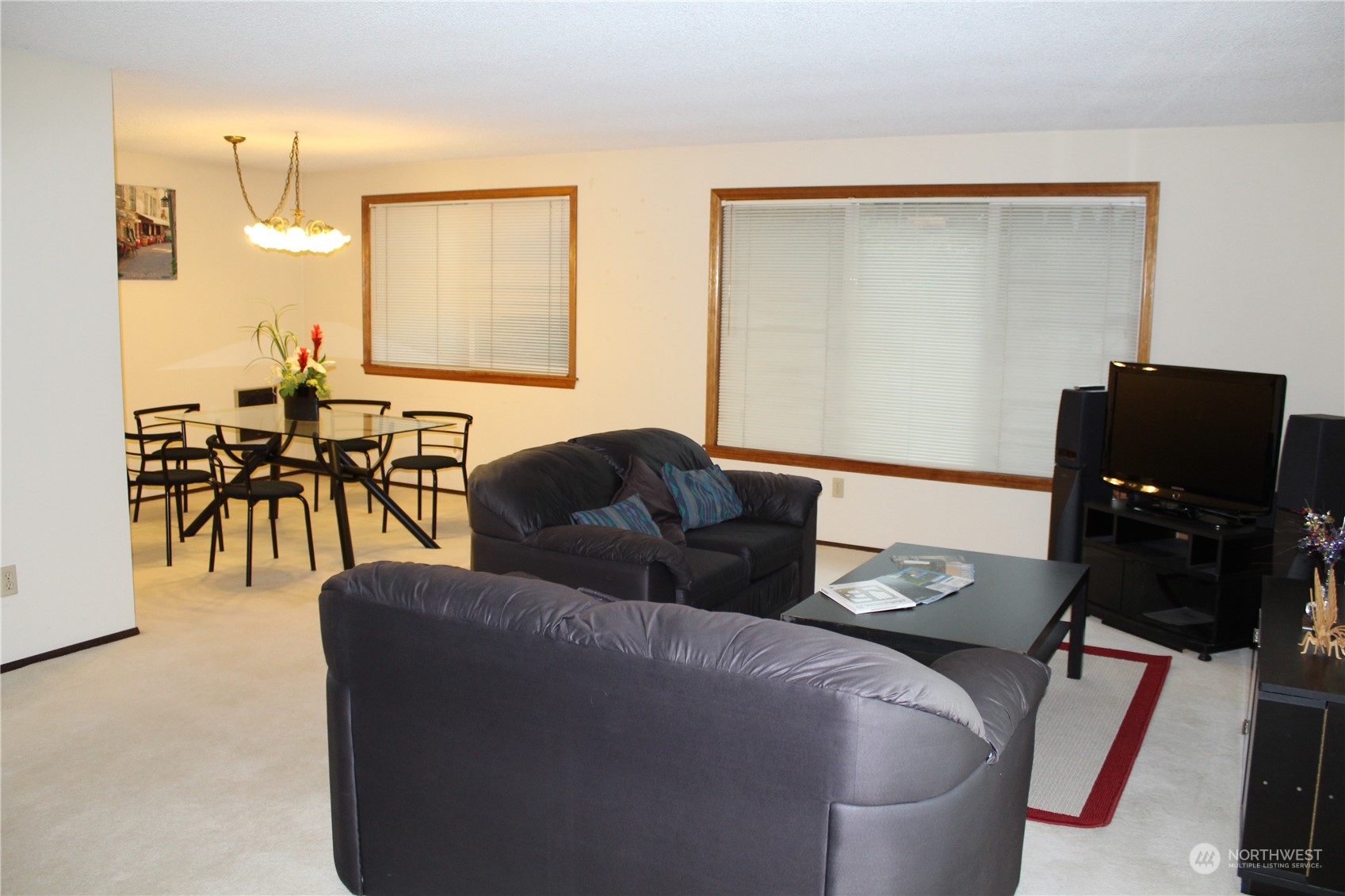 2519 Northeast 145th Street Seattle, WA 98125 - Photo 7 of 34 a living room with furniture and wooden floor