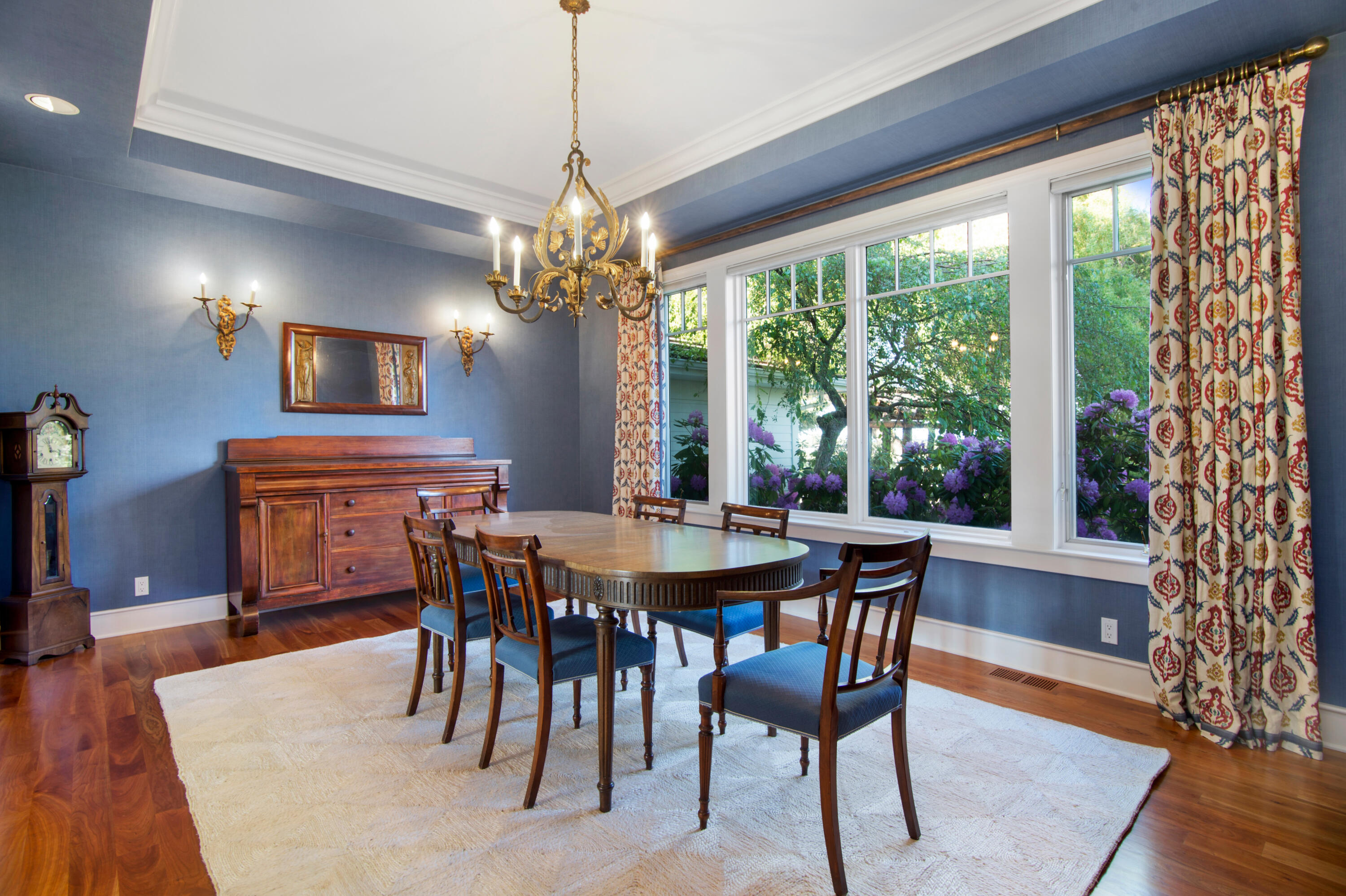 64950 Collins Road Bend, OR 97703 - Photo 30 of 87 a view of a dining room with furniture window and wooden floor