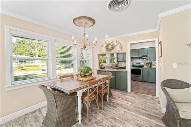 a kitchen with a sink stove and microwave