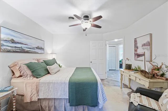 a spacious bathroom with a double vanity sink and a mirror