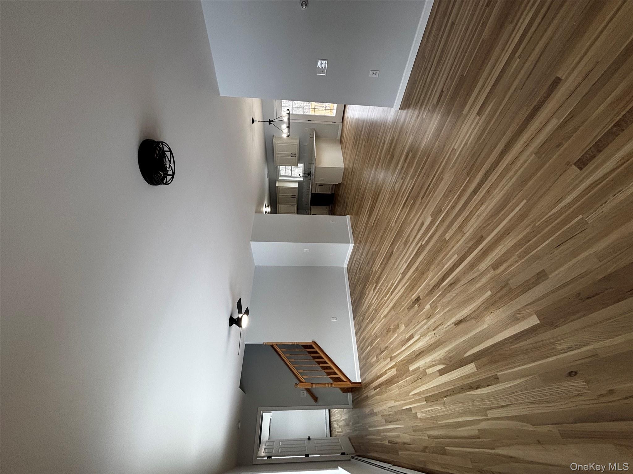 35 Pioneer Road Gardiner, NY 12525 - Photo 11 of 44 a view of empty room with wooden floor