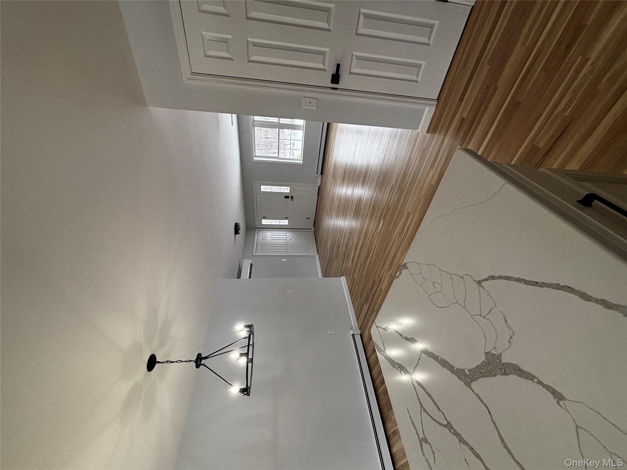 35 Pioneer Road Gardiner, NY 12525 - Photo 12 of 44 a view of an empty room with window and wooden floor