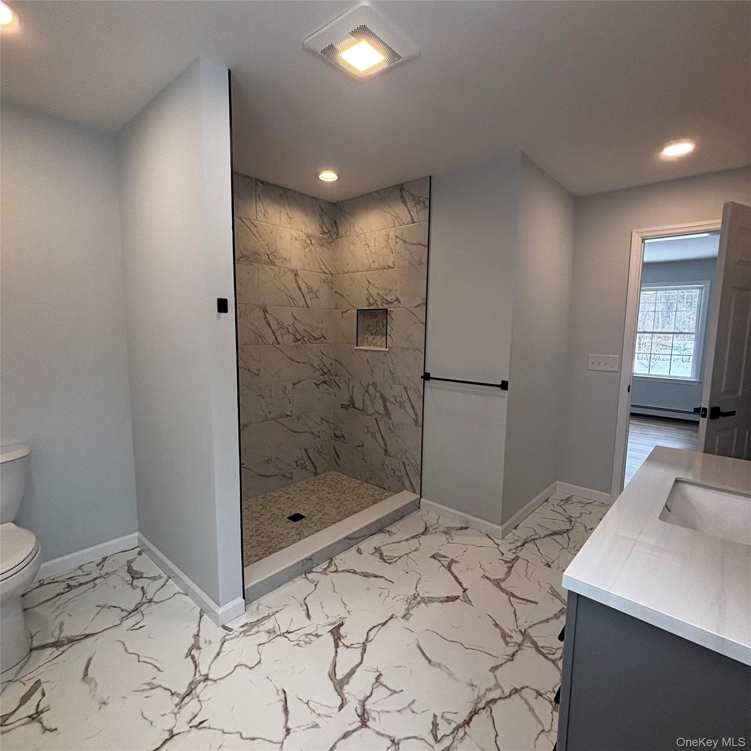 35 Pioneer Road Gardiner, NY 12525 - Photo 17 of 44 a bathroom with a sink and a shower