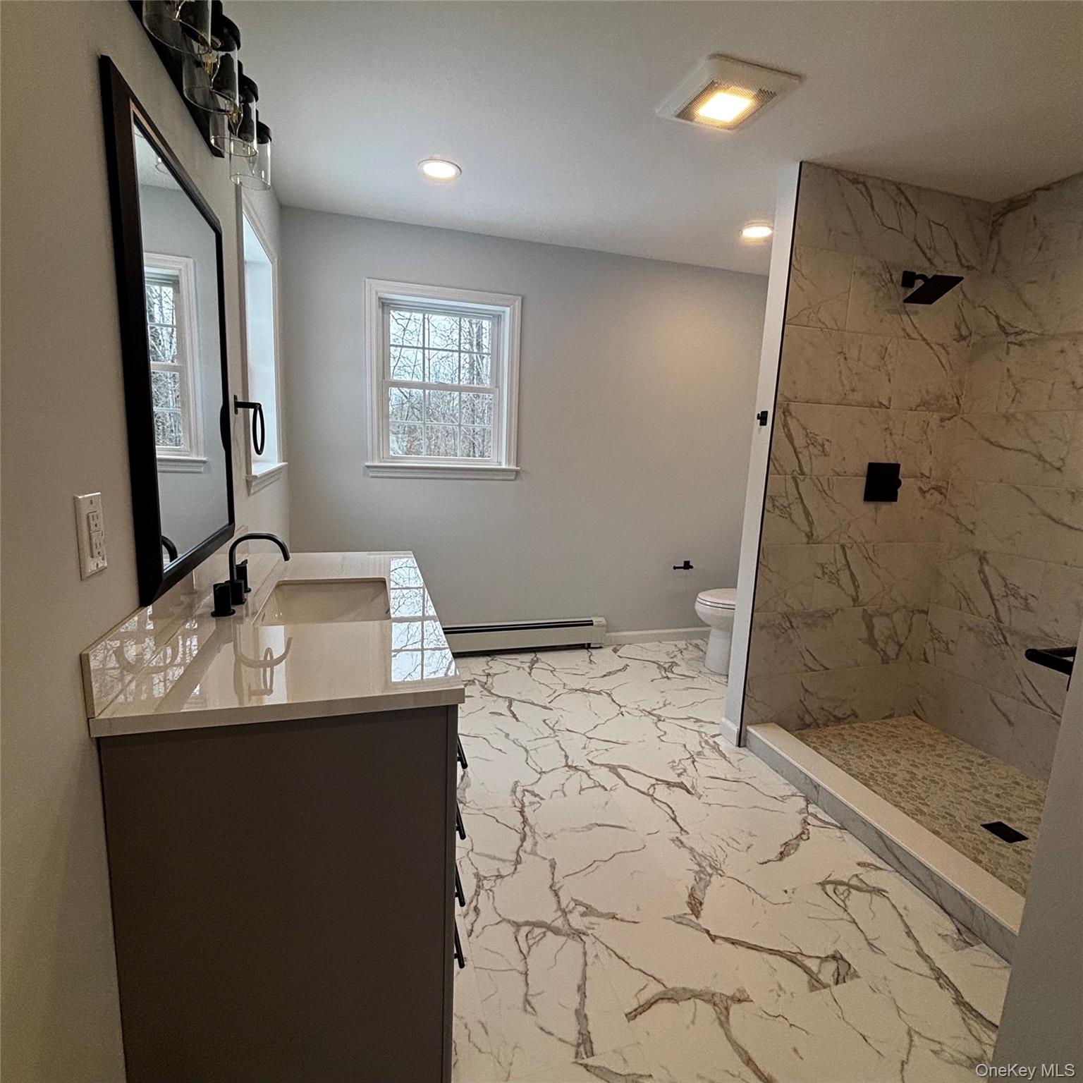 35 Pioneer Road Gardiner, NY 12525 - Photo 21 of 44 a bathroom with a sink toilet and shower