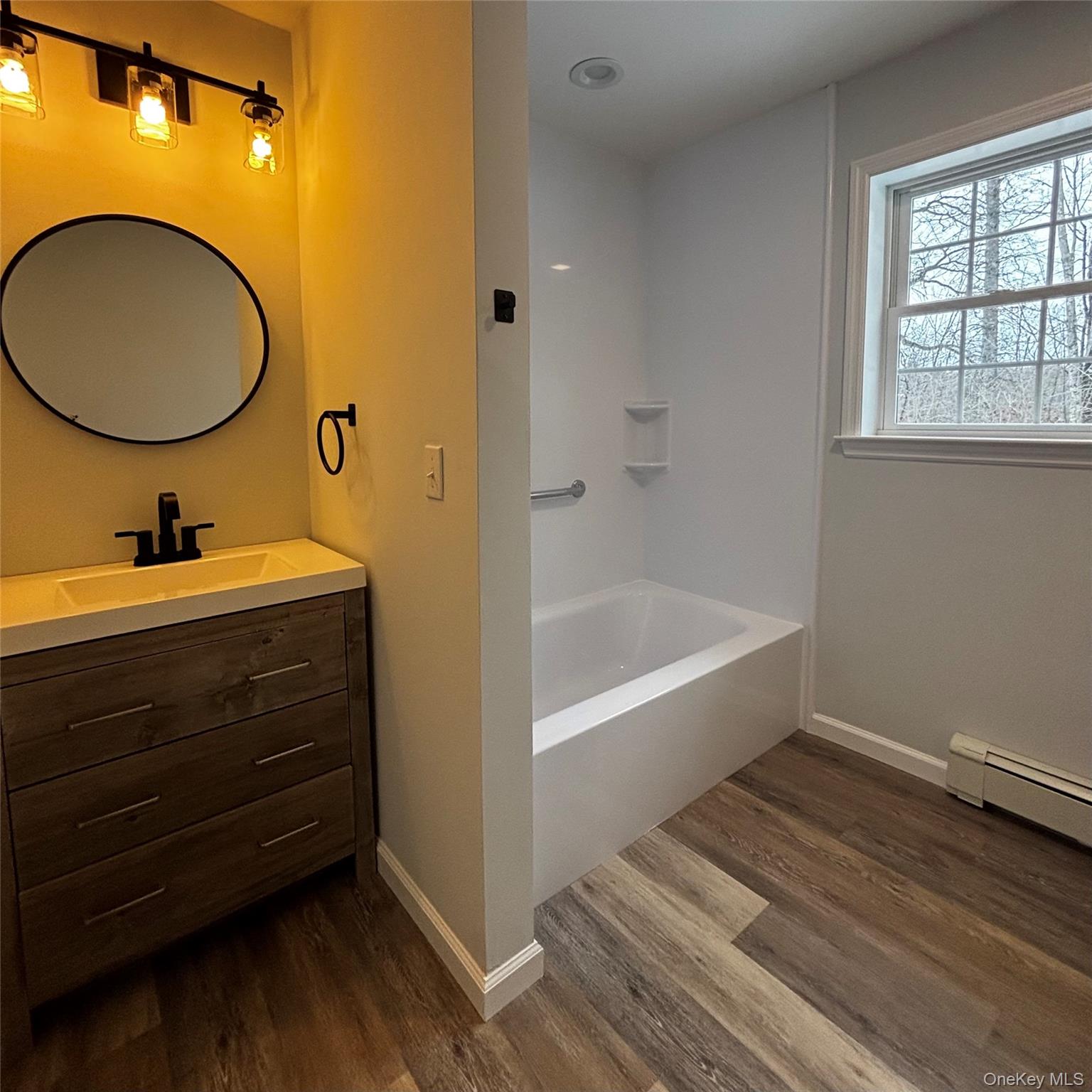 35 Pioneer Road Gardiner, NY 12525 - Photo 23 of 44 a bathroom with a sink and a mirror