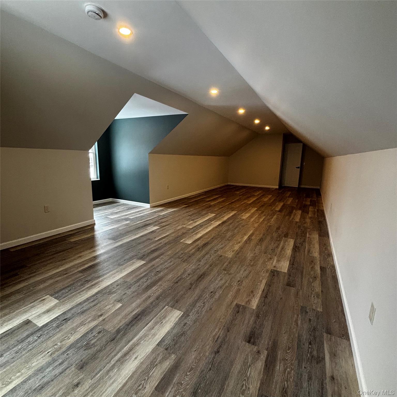 35 Pioneer Road Gardiner, NY 12525 - Photo 34 of 44 a view of an empty room with wooden floor