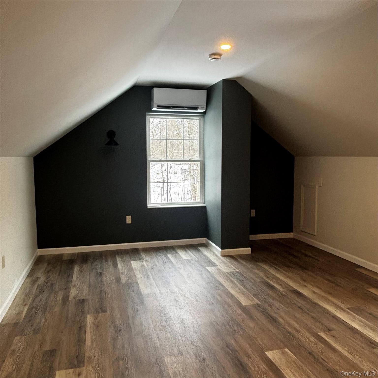 35 Pioneer Road Gardiner, NY 12525 - Photo 35 of 44 a view of an empty room with wooden floor and a window