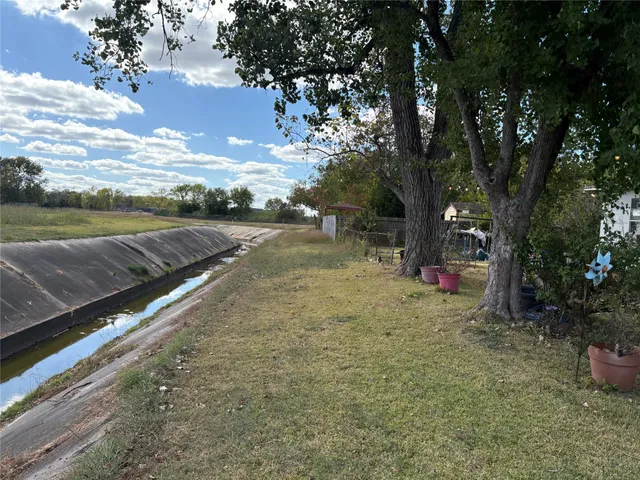 a view of a backyard with mountain view