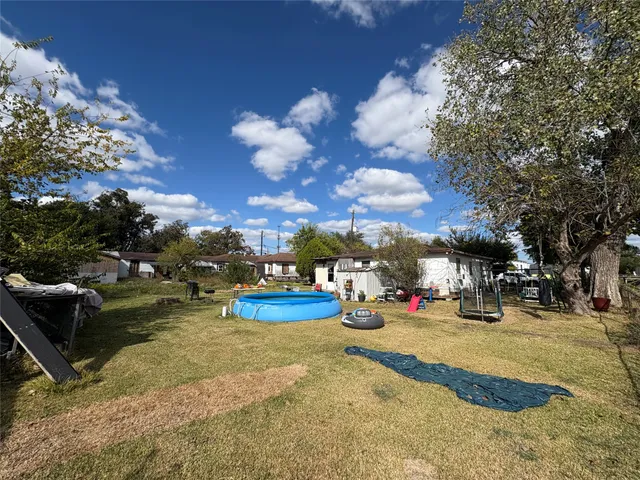 a view of street with parked cars