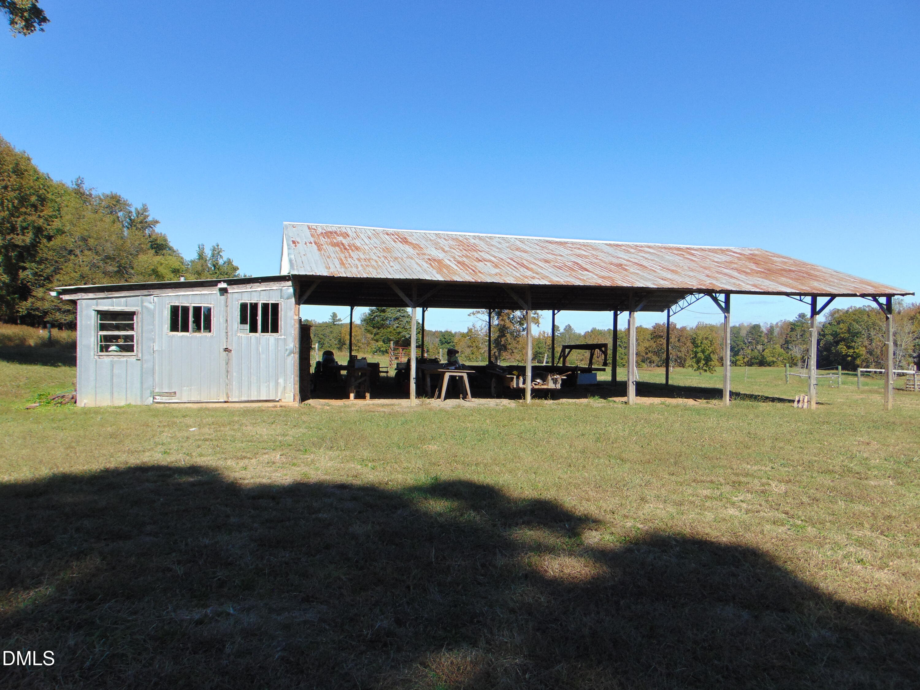 4067 Chewning Road Oxford, NC 27565 - Photo 49 of 82 a view of a house with backyard and balcony