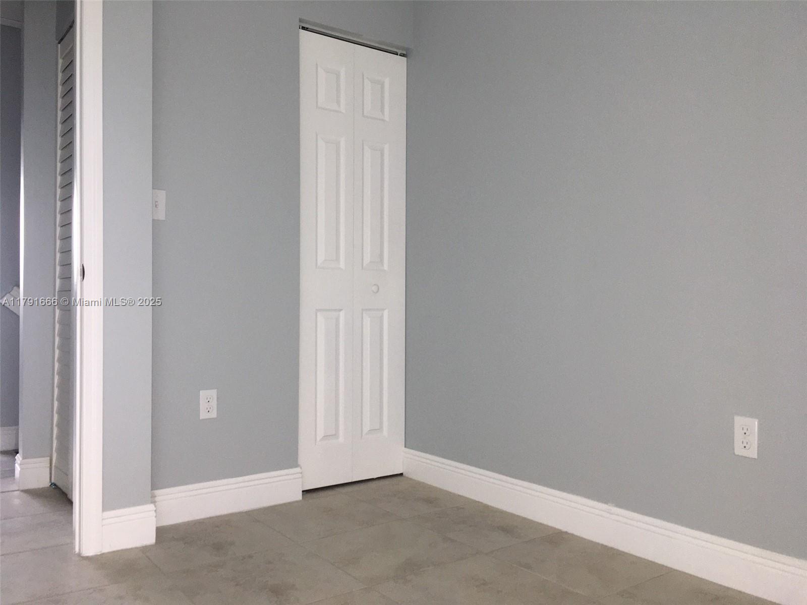 1990 Northwest 4th Court, Unit 8 Miami, FL 33136 - Photo 11 of 19 a view of an empty room