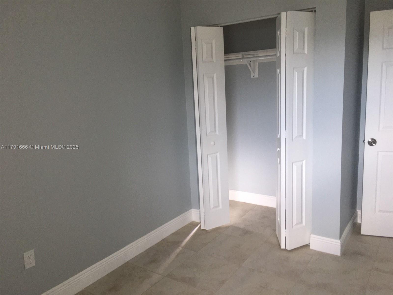 1990 Northwest 4th Court, Unit 8 Miami, FL 33136 - Photo 10 of 19 a view of an empty room