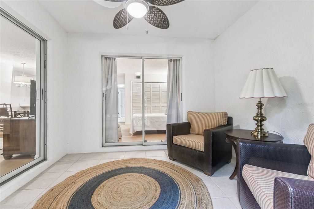 6531 Remus Drive New Port Richey, FL 34653 - Photo 11 of 39 a living room with furniture and a fireplace