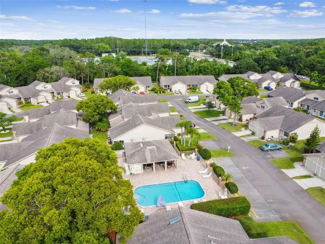 an aerial view of a house with a garden