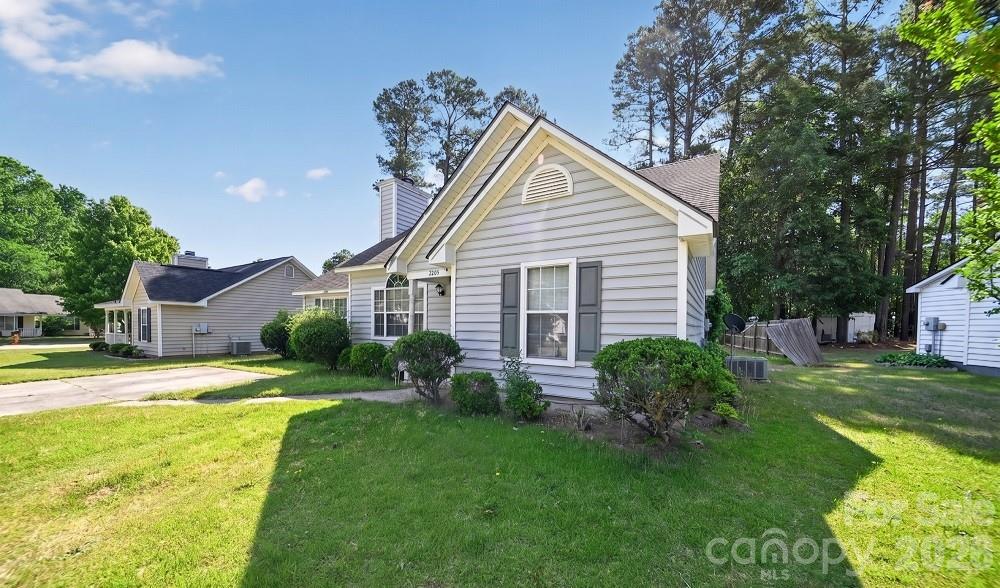 2205 Old Sparta Road Rocky Mount, NC 27804 - Photo 3 of 25 a view of a house with a yard