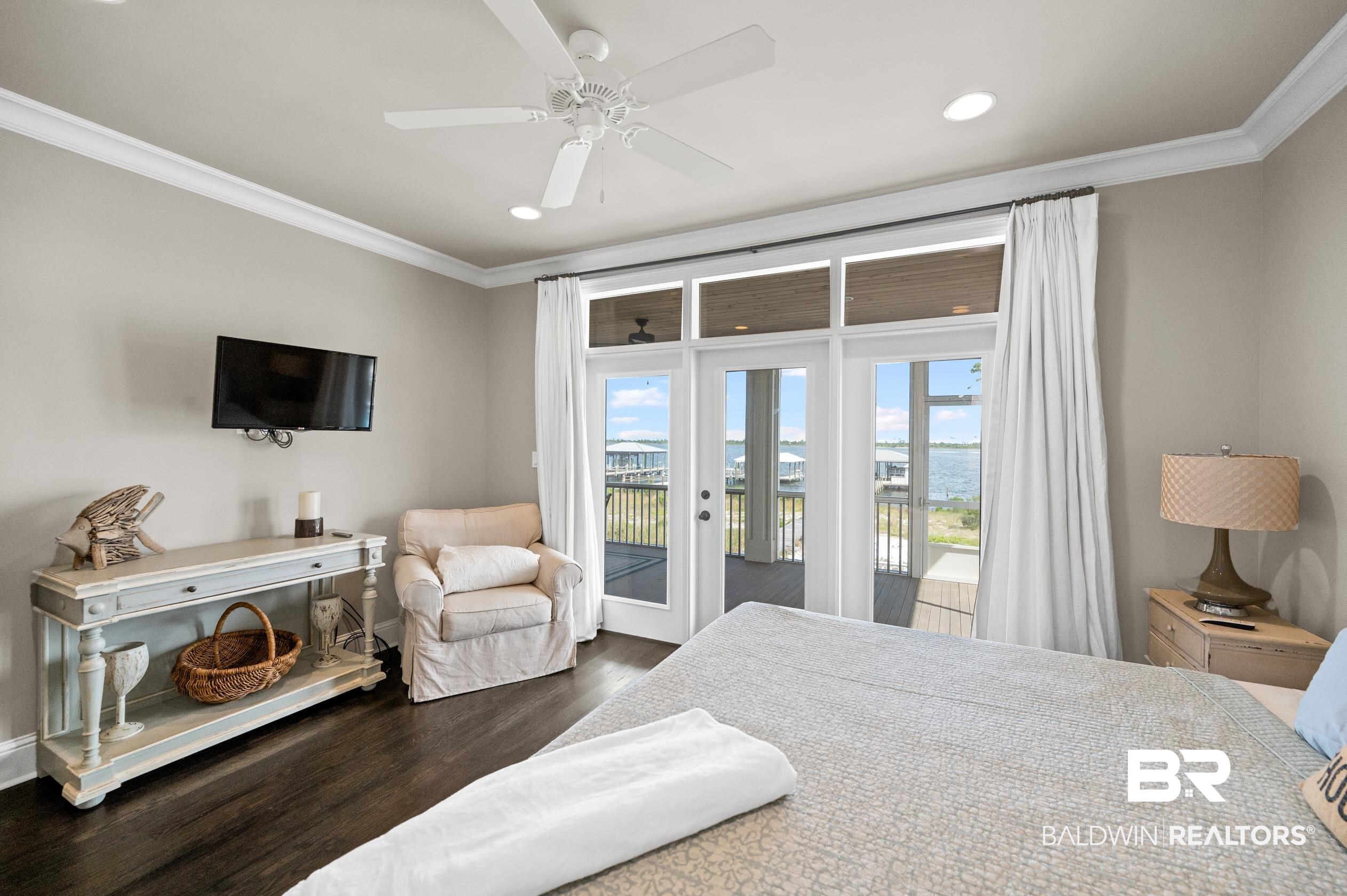 32760 River Road Orange Beach, AL 36561 - Photo 23 of 49 Bedroom 2 with hardwood flooring