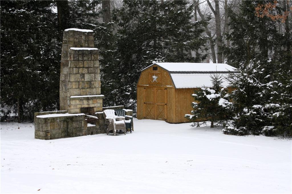 125 Weckerly Road Butler, PA 16002 - Photo 23 of 23 Outdoor stone fireplace (Shed not included with sale of home, but can be negotiated)