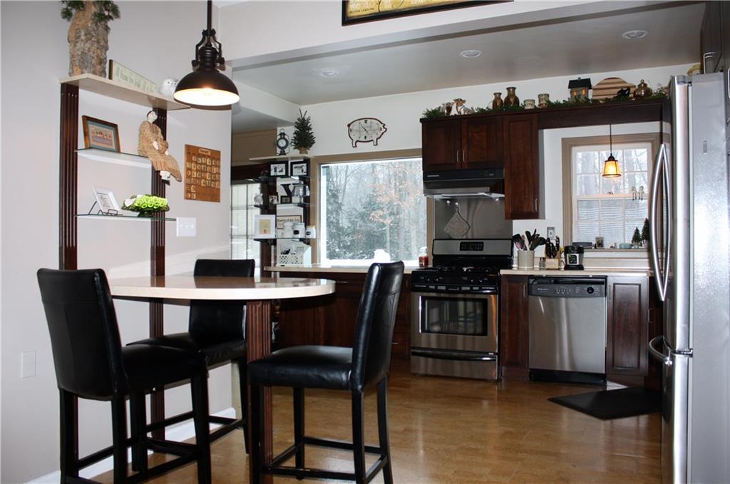 125 Weckerly Road Butler, PA 16002 - Photo 6 of 23 Kitchen with stainless steel appliances, eat in area and great view to the outdoors