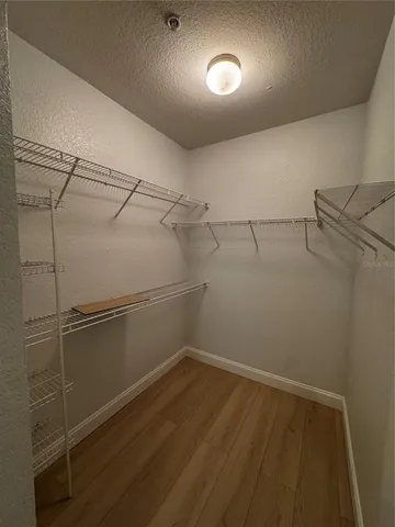 a view of a room with racks on the wall