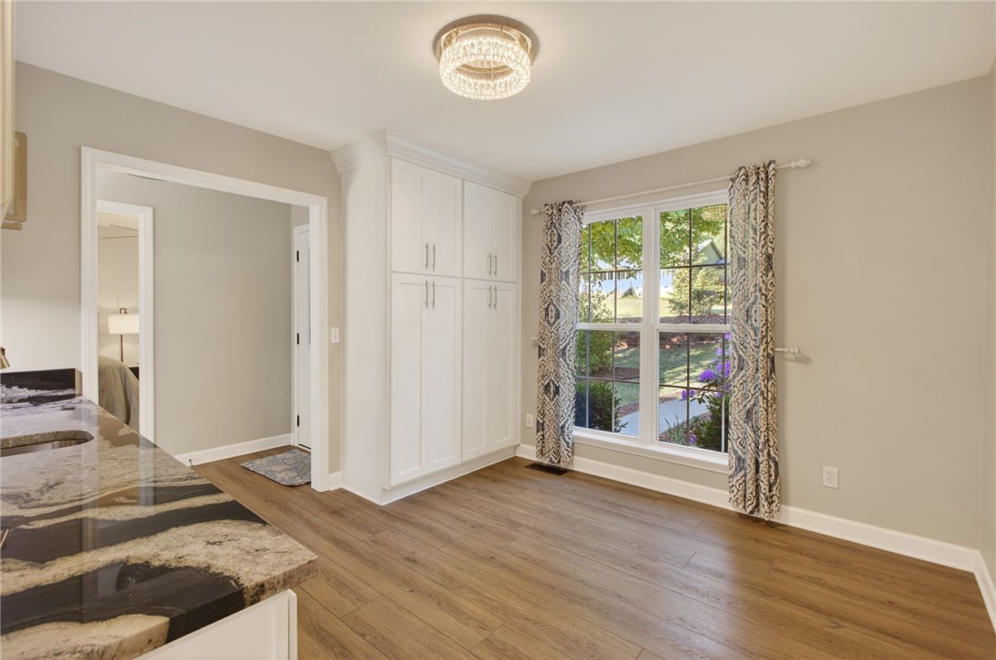 322 Shorecrest Drive Seneca, SC 29672 - Photo 6 of 30 This bright and airy room offers a functional layout with natural light and elegant finishes.