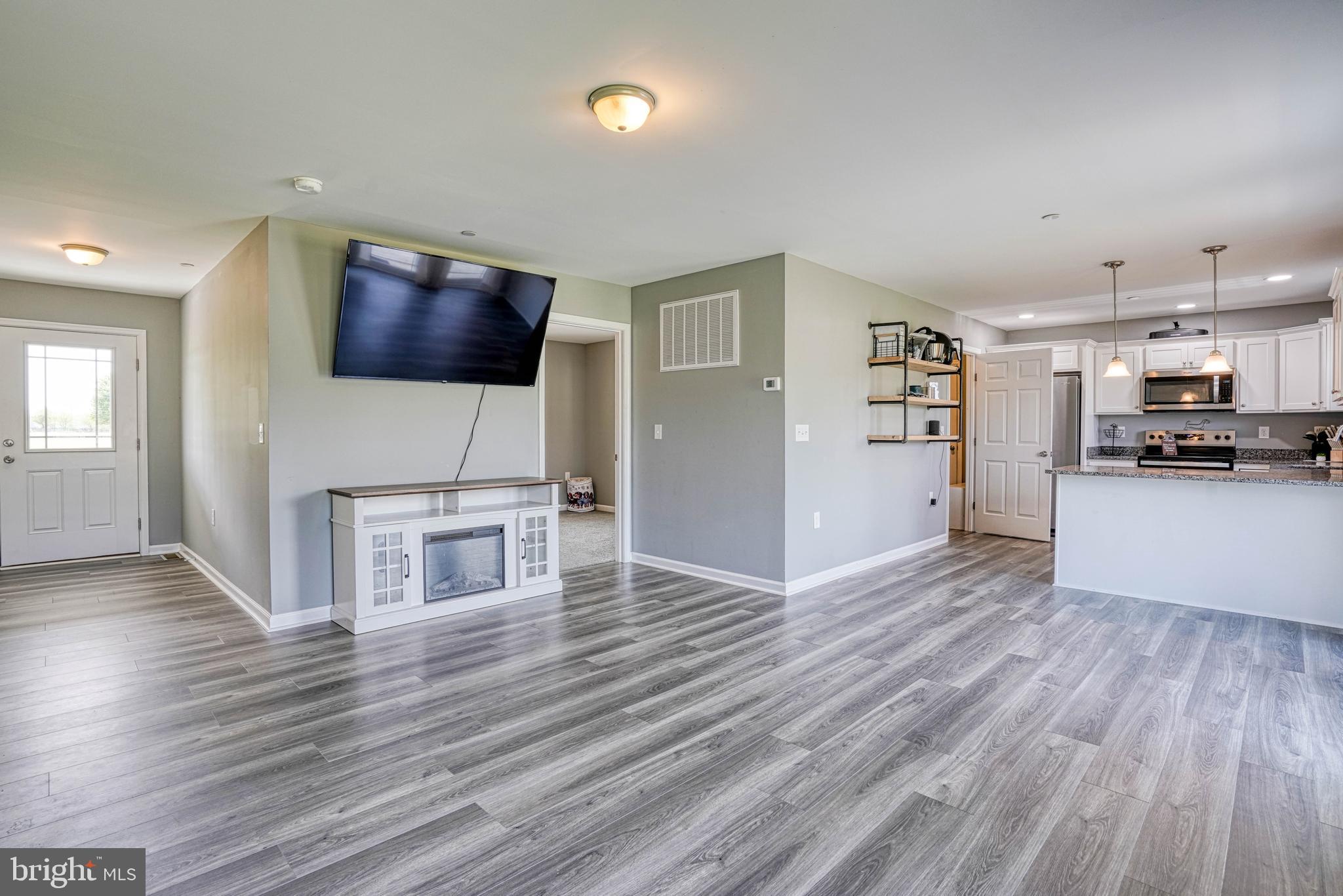 4414 Tranquil Trail Hurlock, MD 21643 - Photo 17 of 58 Family room/ Dining area
