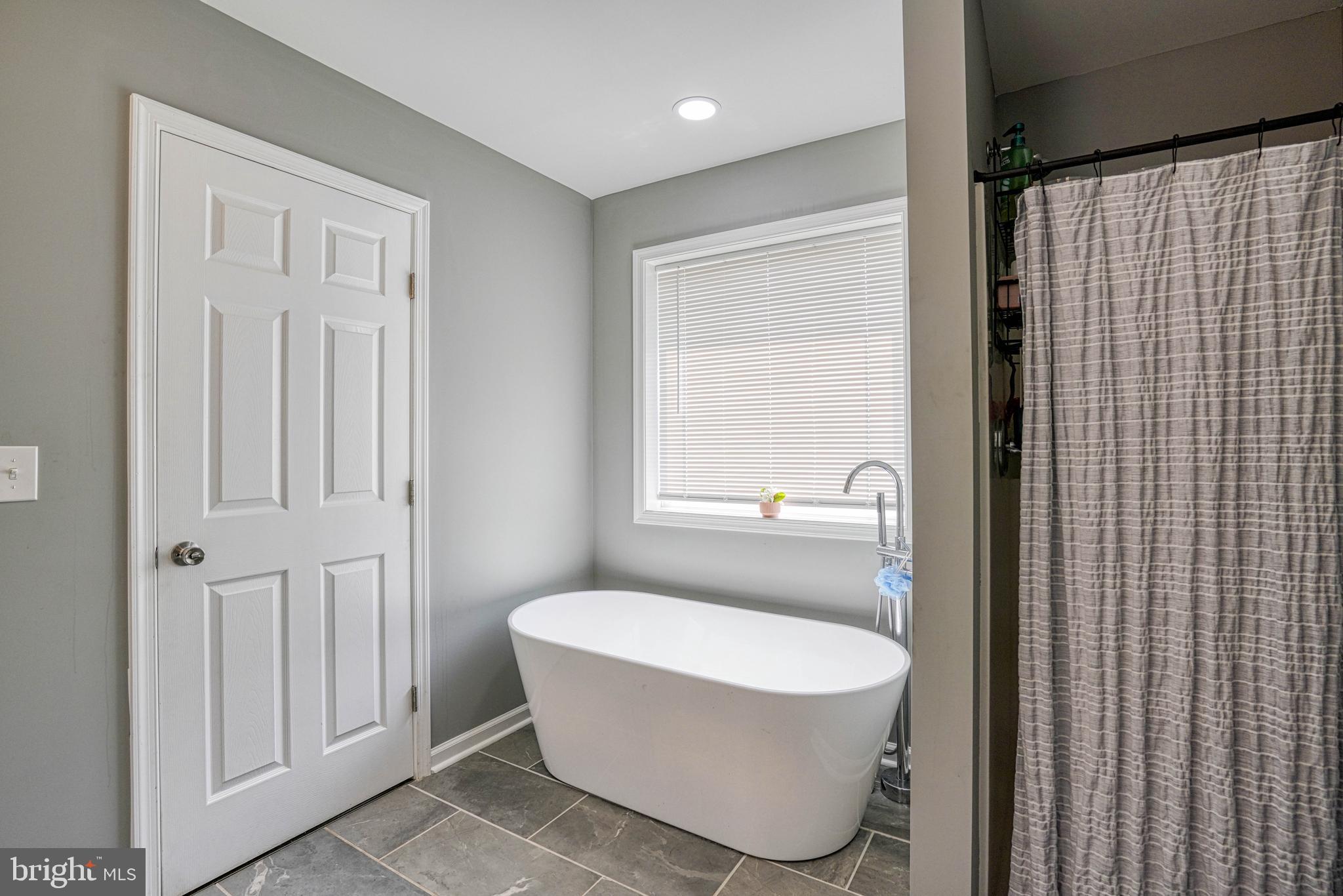 4414 Tranquil Trail Hurlock, MD 21643 - Photo 29 of 58 Primary En-suite - soaking tub and standup shower