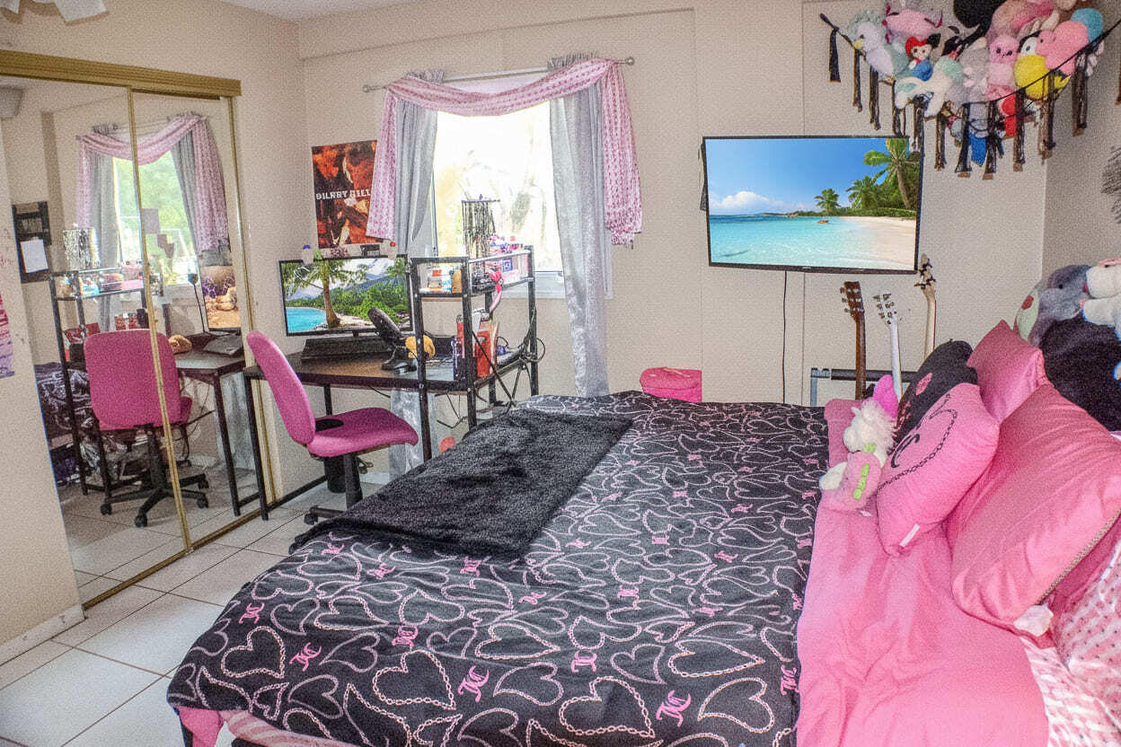 711 Sharon Place Key Largo, FL 33037 - Photo 18 of 38 a bed room with a bed and a chair