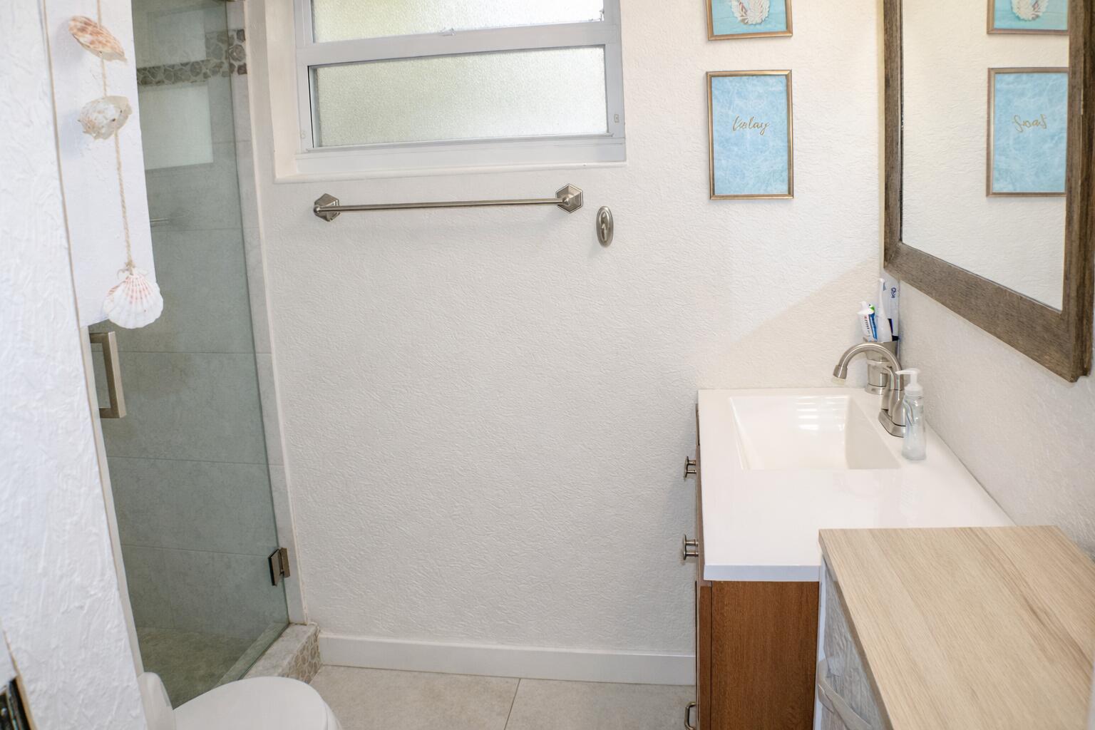 711 Sharon Place Key Largo, FL 33037 - Photo 22 of 38 a bathroom with a sink and a mirror