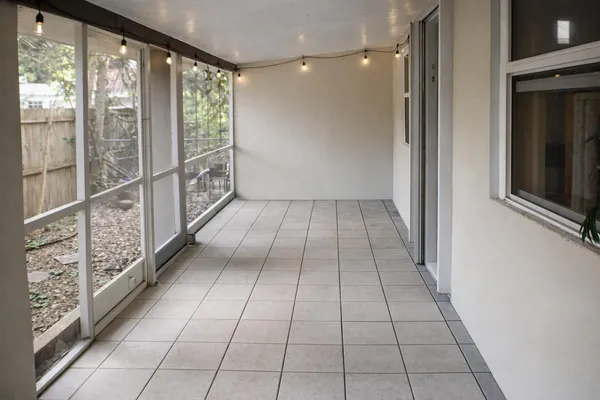 a view of empty room with windows