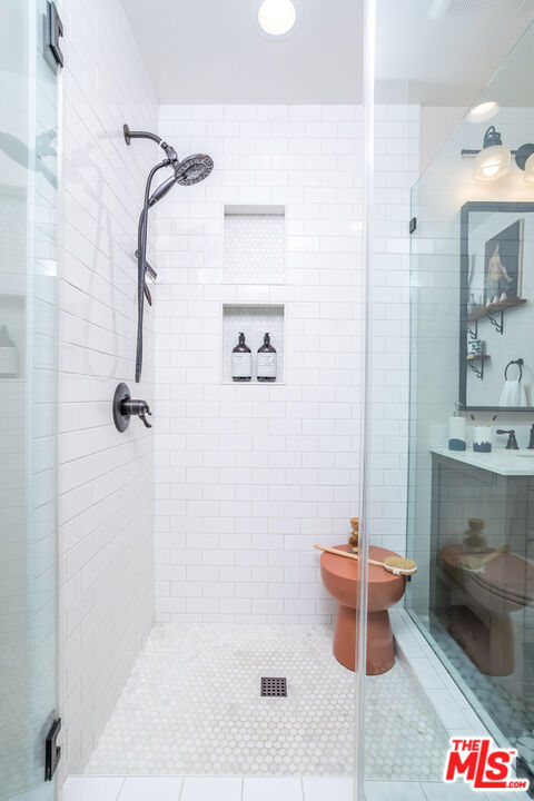 2850 Buckingham Road Los Angeles, CA 90016 - Photo 22 of 34 a bathroom with a sink toilet and shower