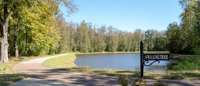 a picture of white wall with a sign on it
