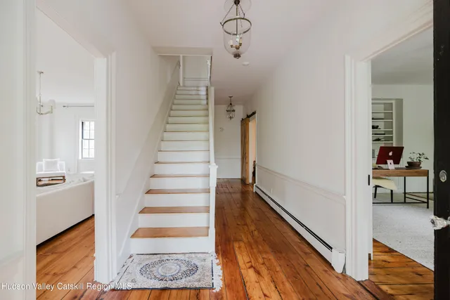 a kitchen with stainless steel appliances a sink and cabinets
