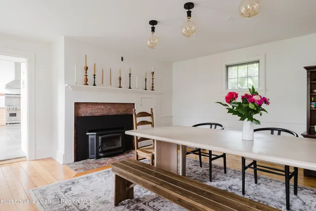 a kitchen with a sink a counter and a wooden cabinets