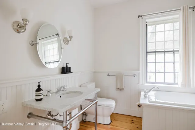 a living room with furniture and a view of living room