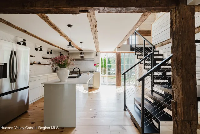 front view of a house with a garden