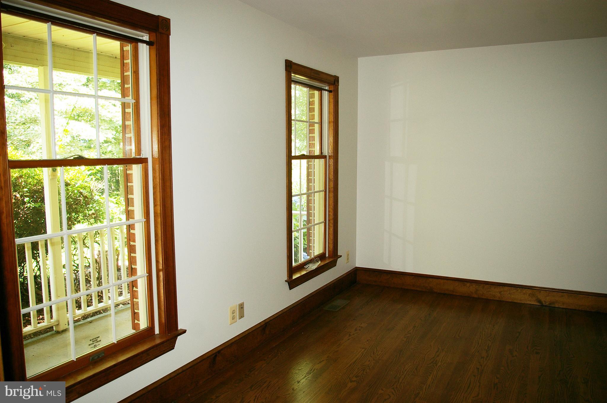 203 Holy Cross Road Street, MD 21154 - Photo 6 of 21 Living Room w/ 2 Large Windows