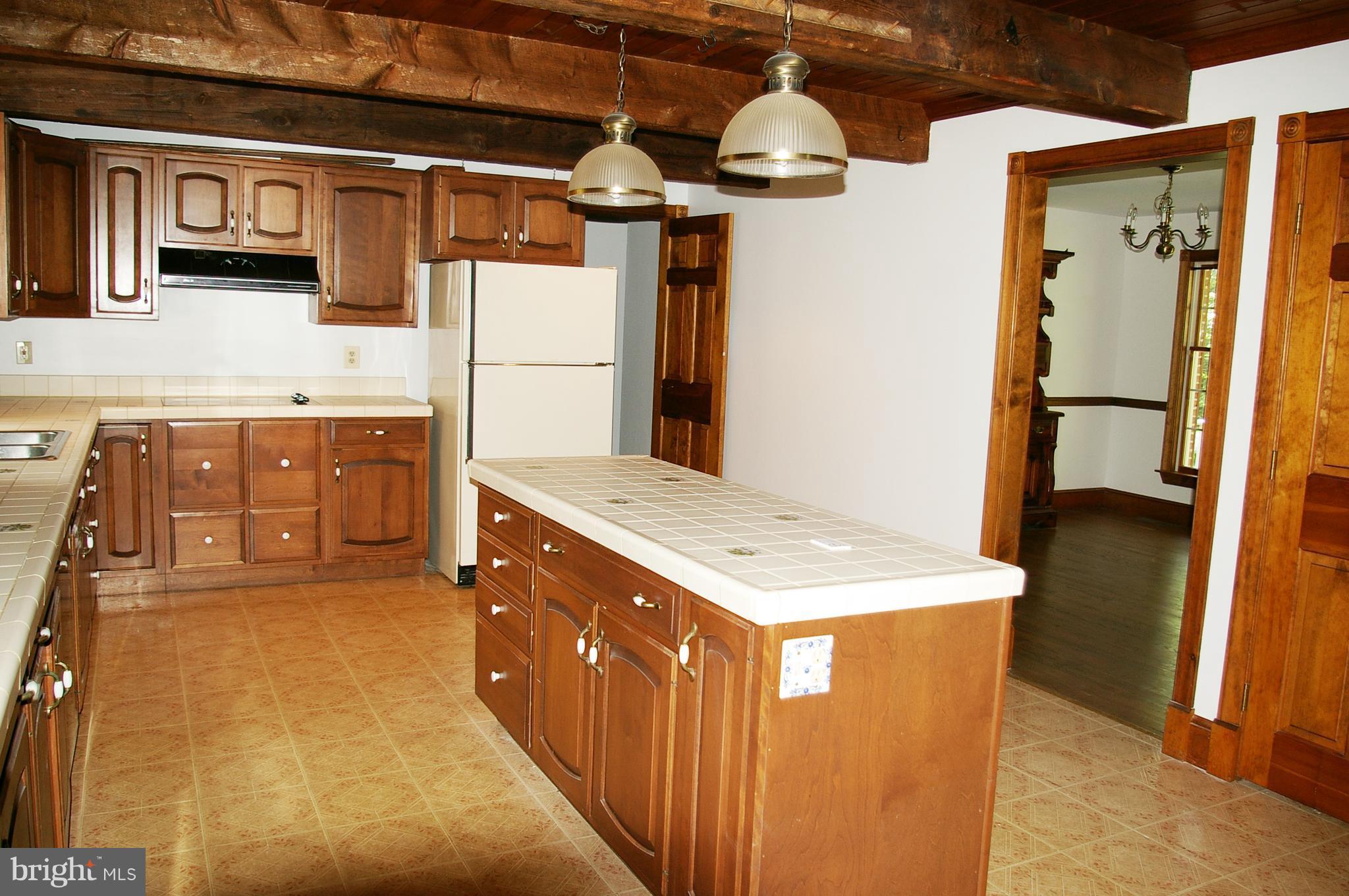 203 Holy Cross Road Street, MD 21154 - Photo 10 of 21 You Will Find Many Uses from the Large Center Isla