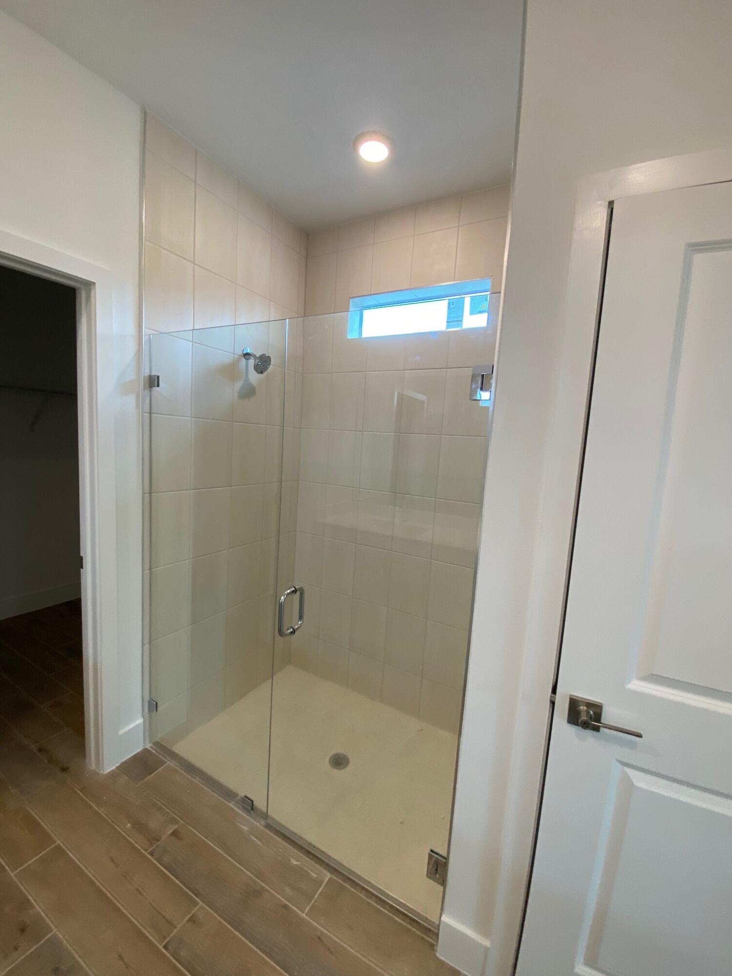 6900 Southeast Park Trace Drive Stuart, FL 34997 - Photo 12 of 14 a bathroom with a shower