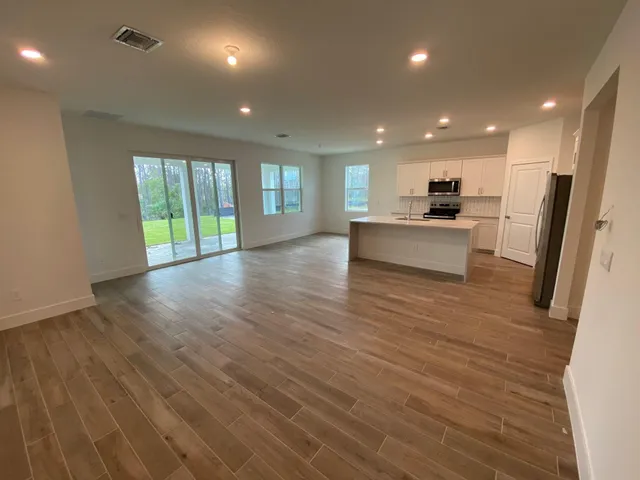 a view of kitchen and microwave