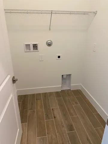 a view of a room with racks on the wall