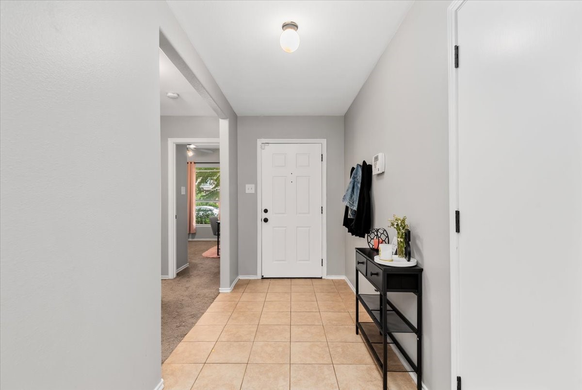 12716 Rio Lindo Street Rosharon, TX 77583 - Photo 3 of 17 a room that has a bed and a chair in it