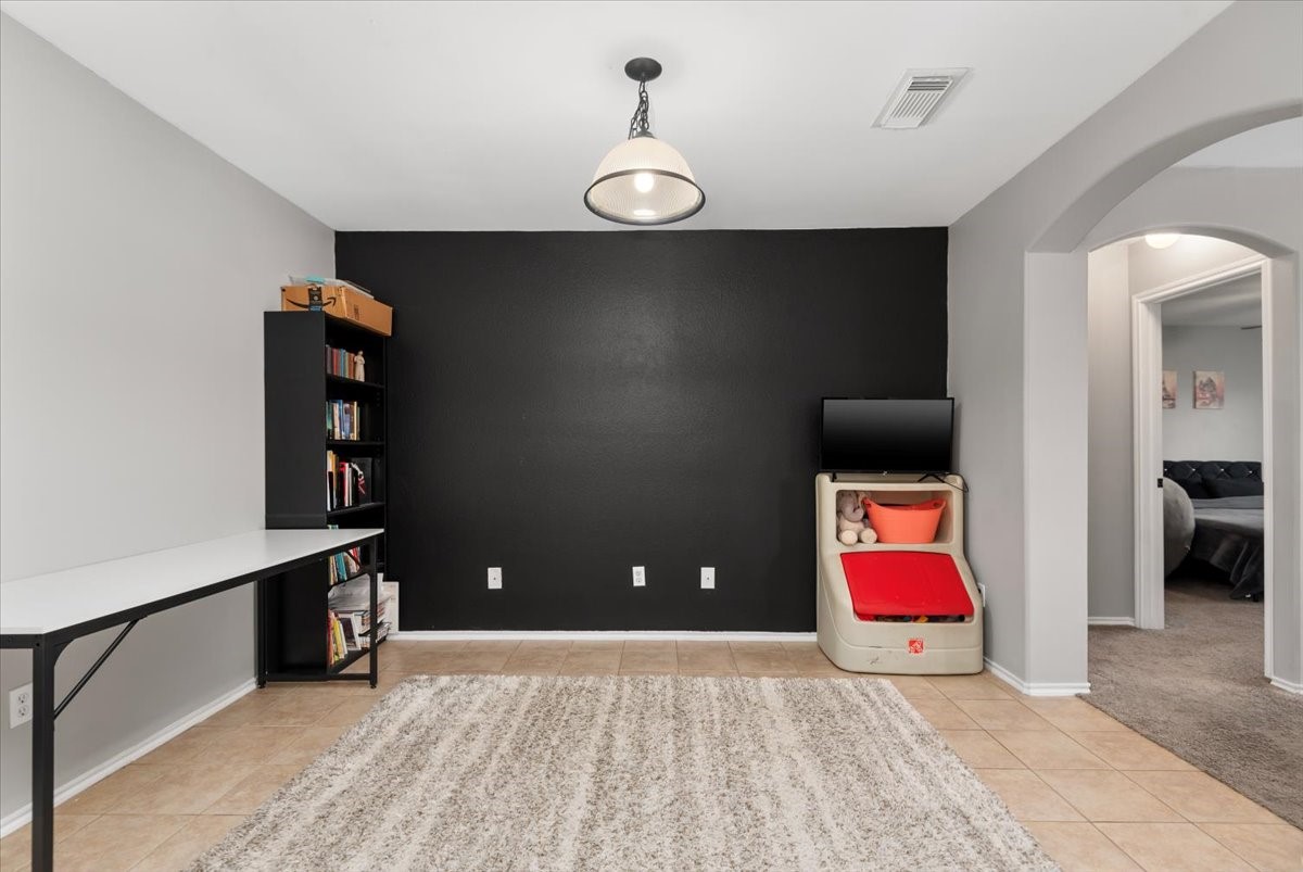 12716 Rio Lindo Street Rosharon, TX 77583 - Photo 6 of 17 a view of a room with gym equipment