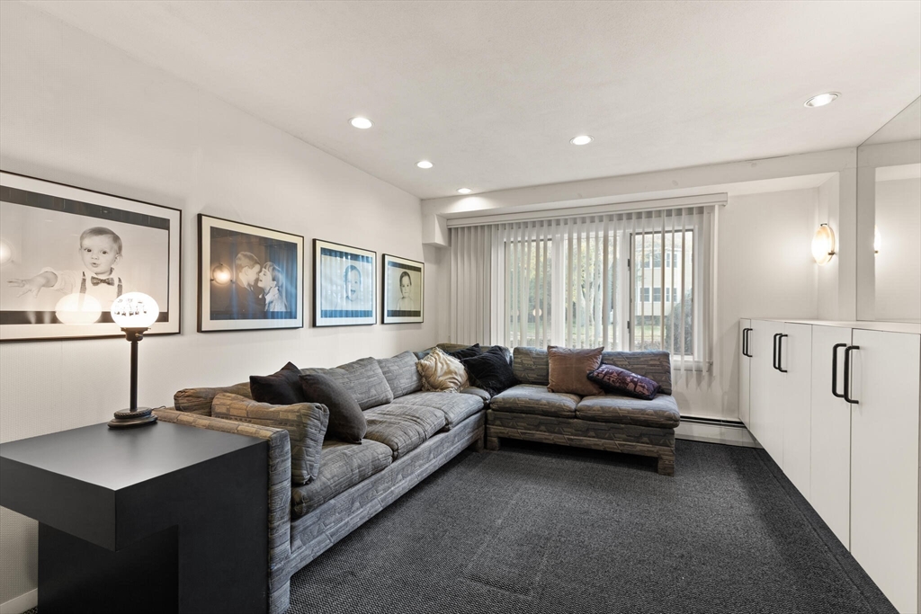 19 Selwyn Road Newton, MA 02461 - Photo 18 of 23 a living room with furniture and a large window