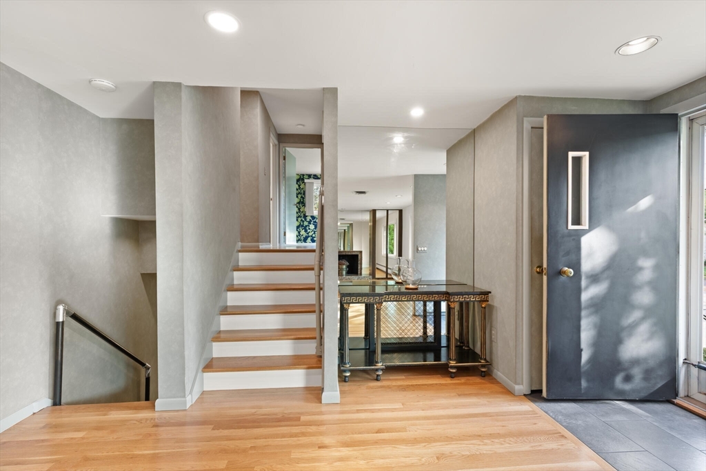 19 Selwyn Road Newton, MA 02461 - Photo 8 of 23 a view of a hallway with wooden floor and entryway