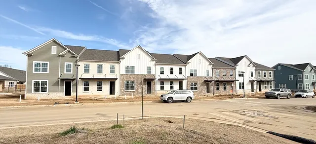 a view of a street with cars