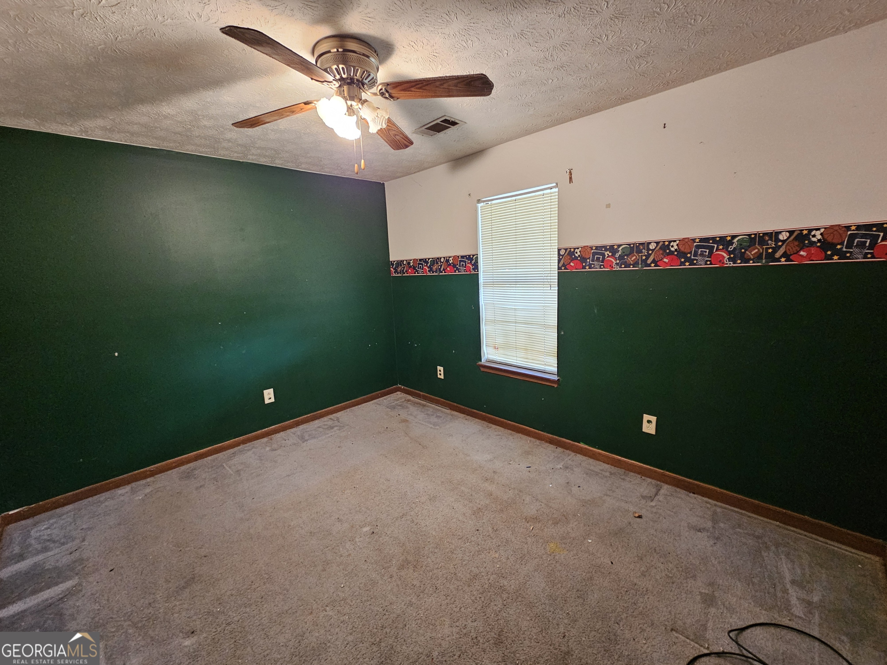 1596 Bonanza Church Road Jonesboro, GA 30236 - Photo 14 of 30 a view of an empty room with a fan